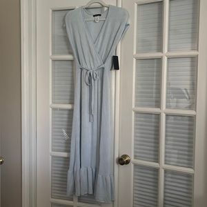 Size small light blue and white striped dress. NWT.